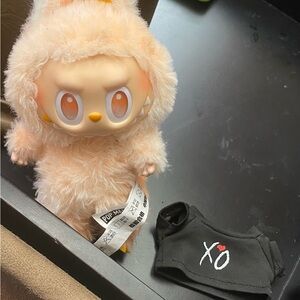 Real pop mart happiness labubu with an XO shirt for the labubu